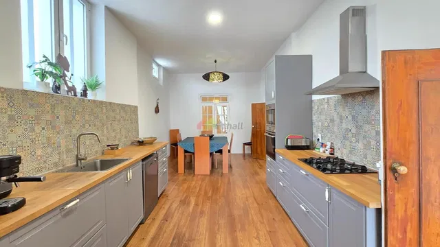 Kitchen; kitchen appliances, natural light, modern style, wood floor