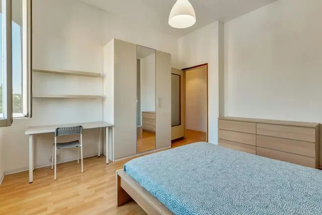 Bedroom; natural light, wood floor