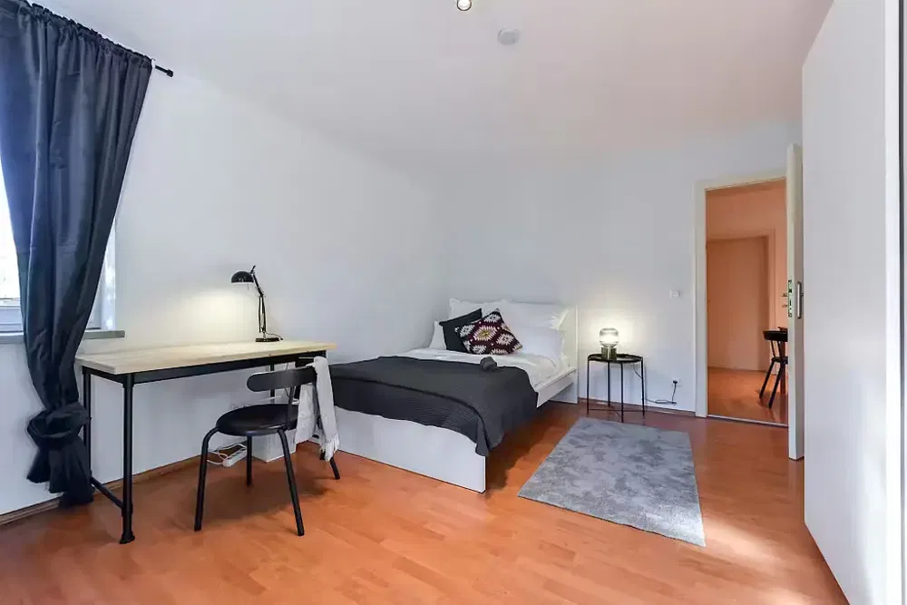 Bedroom; natural light, wood floor
