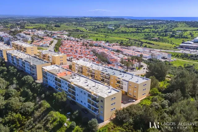 House and surroundings; view
