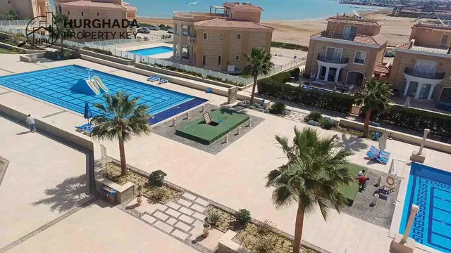 House and surroundings; view