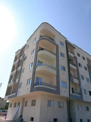 House and surroundings; view