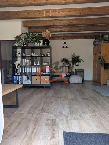 Living room; wood beams, wood floor, natural light, rustic style