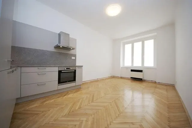 Kitchen; kitchen appliances, wood floor, natural light, renovated