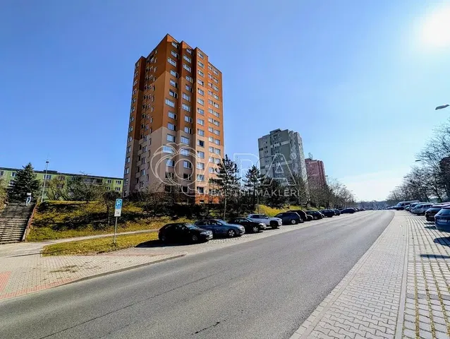 House and surroundings; view