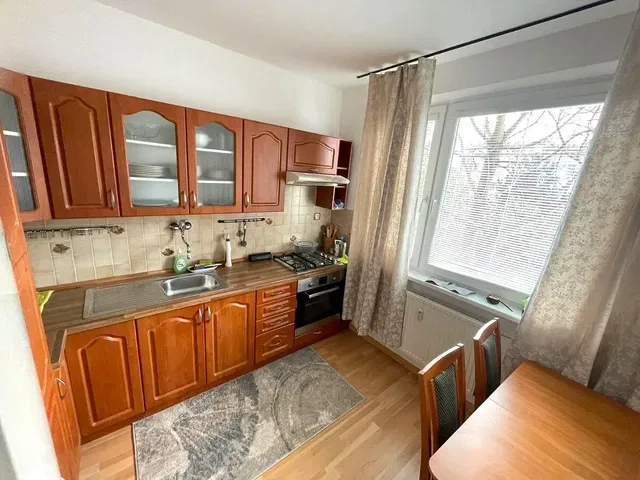 Kitchen; kitchen appliances, tile floor, natural light