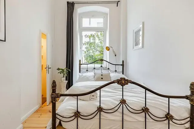 Bedroom; natural light, wood floor