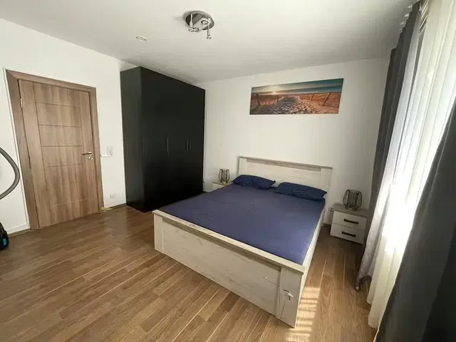 Bedroom; wood floor, natural light