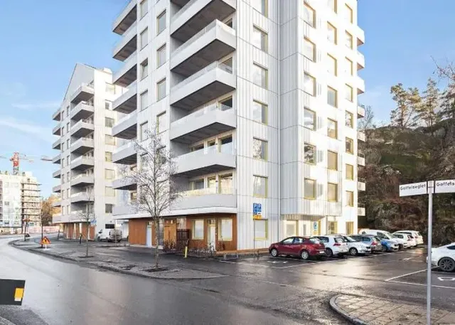 House and surroundings; view