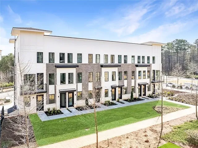 House and surroundings; view