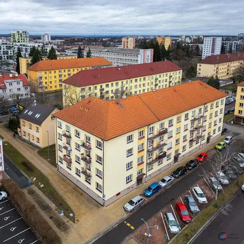 House and surroundings; view