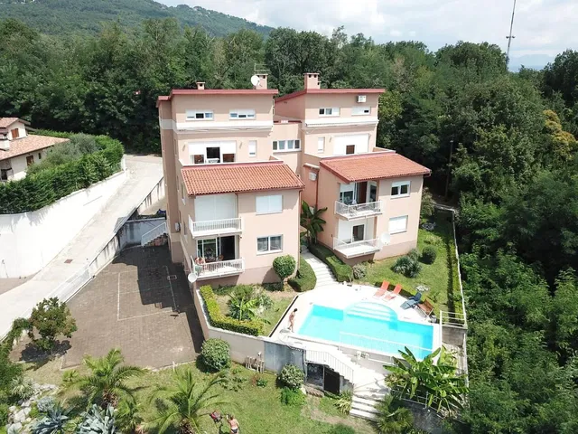 House and surroundings; view, natural light