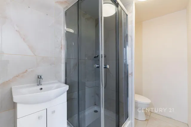 Bathroom; tile floor, natural light, renovated