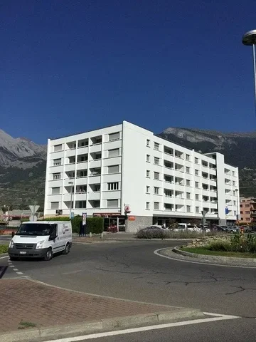 House and surroundings; view