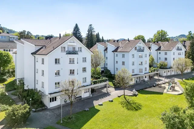 House and surroundings; view