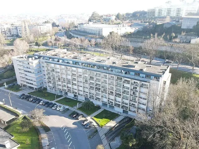 House and surroundings; view