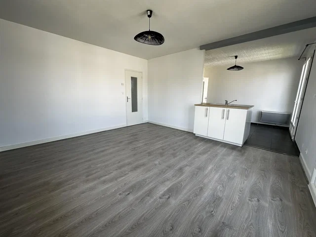 Living room; natural light, renovated, wood floor