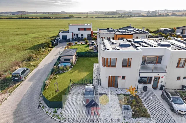 House and surroundings; view