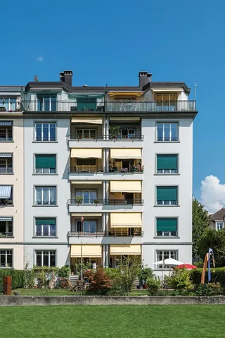 House and surroundings; view