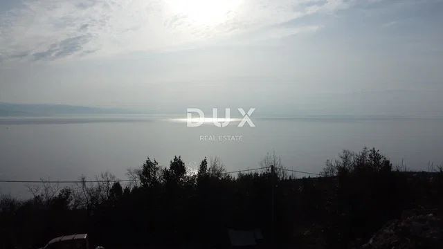 House and surroundings; view