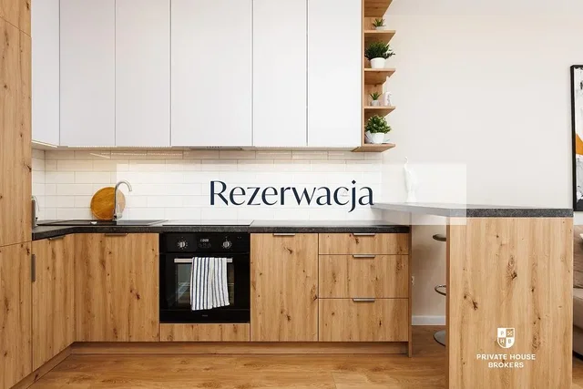 Cuisine; électroménager, parquet, rénové, lumière naturelle, style moderne
