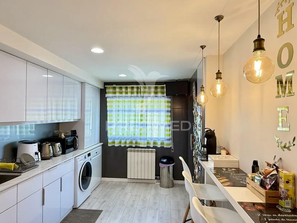 Kitchen; kitchen appliances, tile floor, natural light, modern style