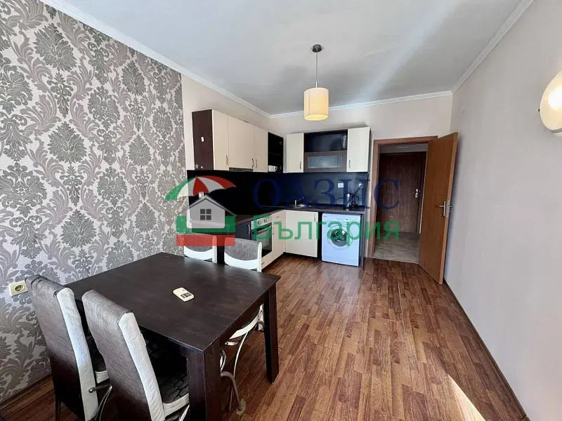 Kitchen; wood floor, natural light, kitchen appliances