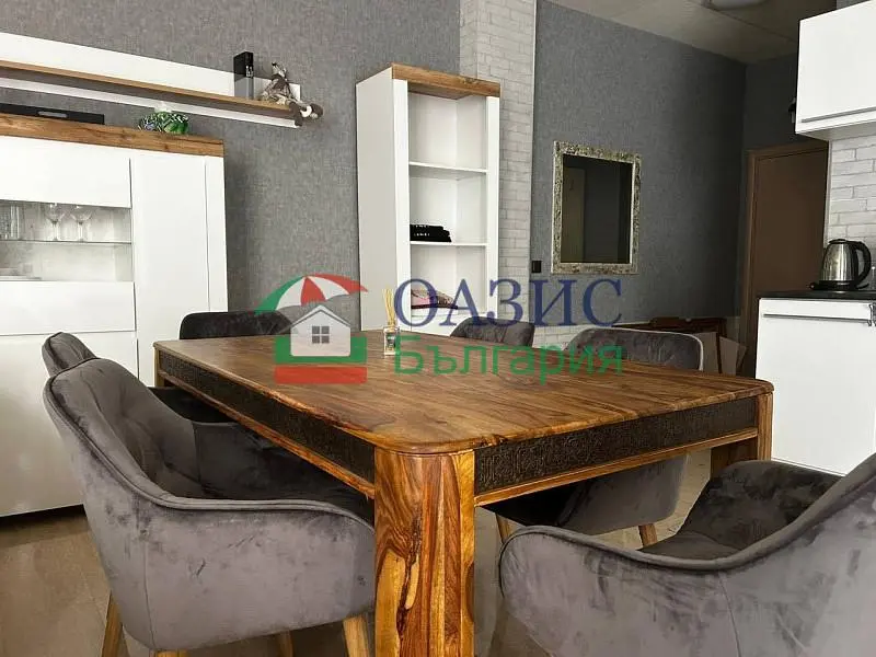 Kitchen; kitchen appliances, wood floor, modern style