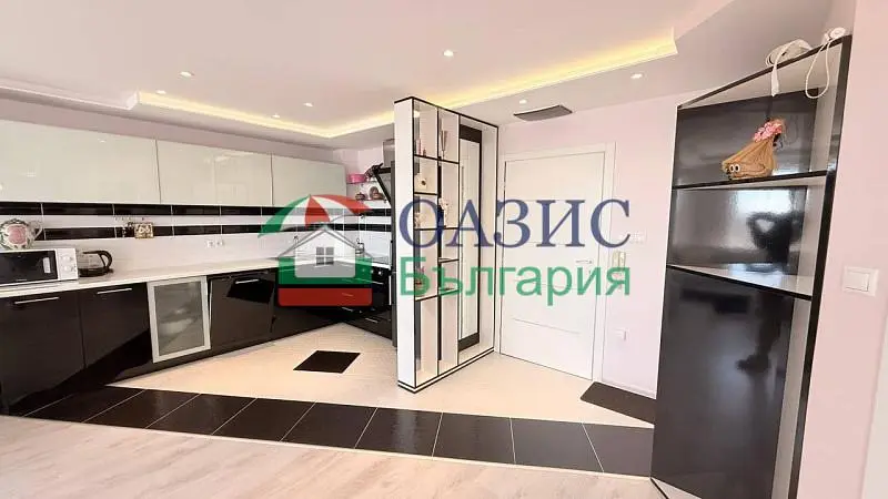 Kitchen; kitchen appliances, tile floor, renovated, natural light