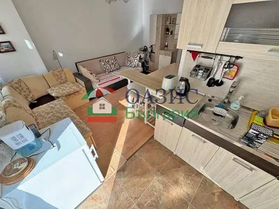 Kitchen; kitchen appliances, tile floor, natural light