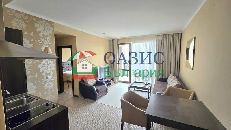 Living room; kitchen appliances, natural light