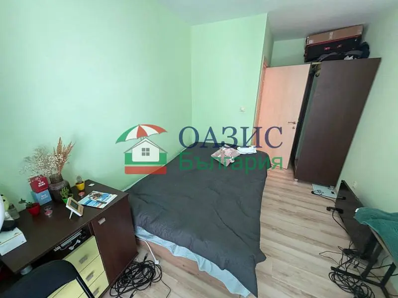 Bedroom; wood floor, natural light