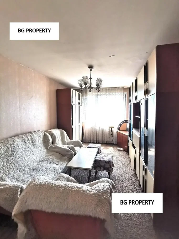 Living room; natural light, needs renovation