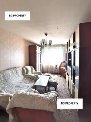 Living room; natural light, needs renovation