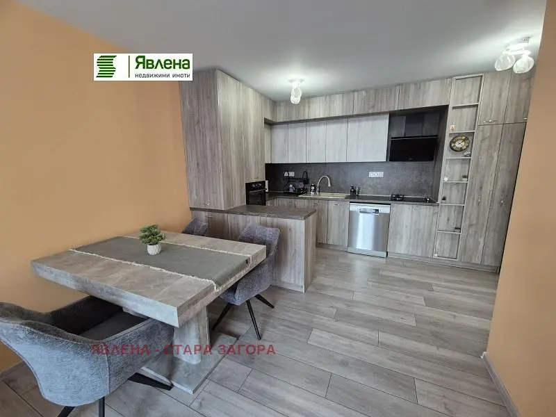 Kitchen; kitchen appliances, wood floor, renovated, natural light