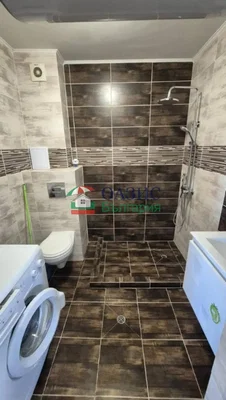 Toilet; tile floor, needs renovation