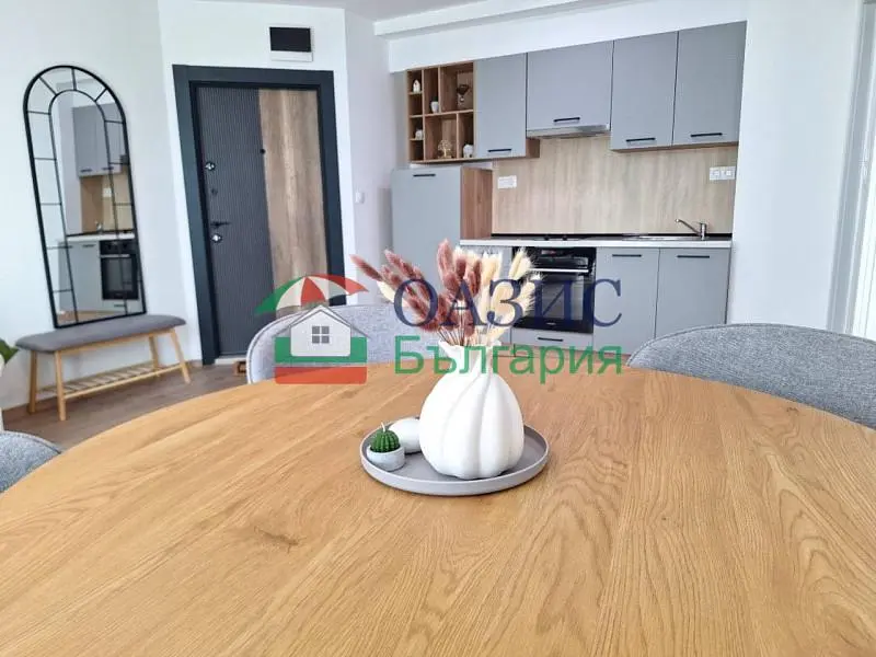 Kitchen; kitchen appliances, wood floor, renovated, natural light