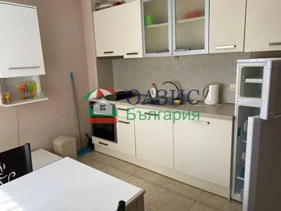 Kitchen; kitchen appliances, tile floor, natural light