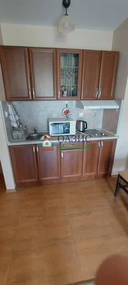 Cucina; pavimento in piastrelle, elettrodomestici