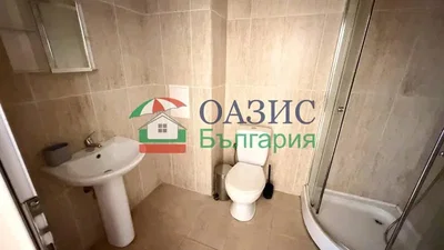 Toilet; tile floor, natural light