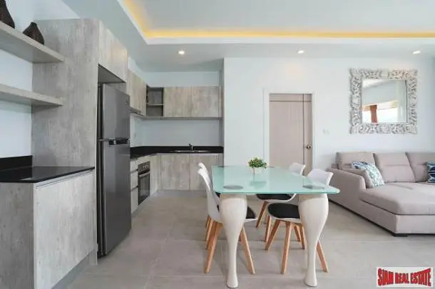 Living room; kitchen appliances, tile floor, natural light, modern style