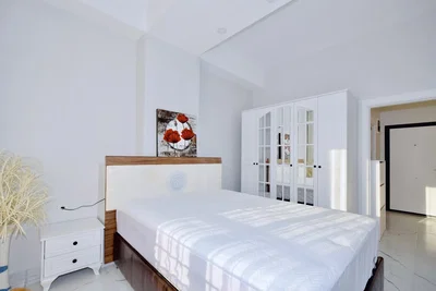 Bedroom; natural light, tile floor