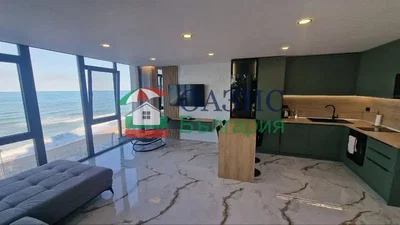 Living room; view, kitchen appliances, wood floor