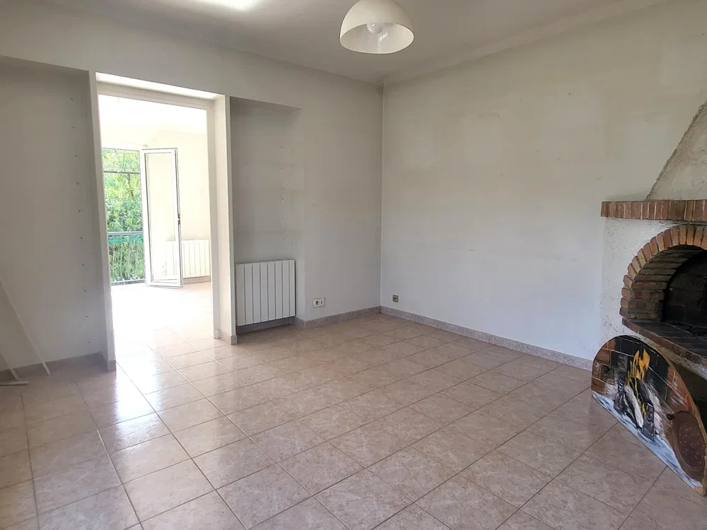 Living room; tile floor, fireplace, natural light