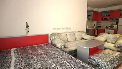 Living room; kitchen appliances, natural light