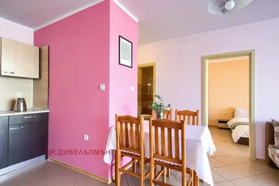 Kitchen; kitchen appliances, tile floor, natural light