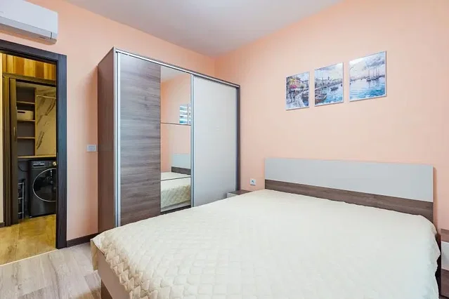 Bedroom; natural light, wood floor