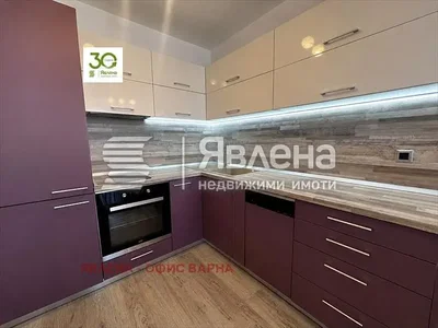 Kitchen; kitchen appliances, wood floor, natural light, renovated
