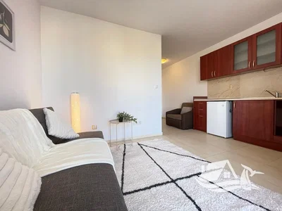 Living room; tile floor, natural light, modern style