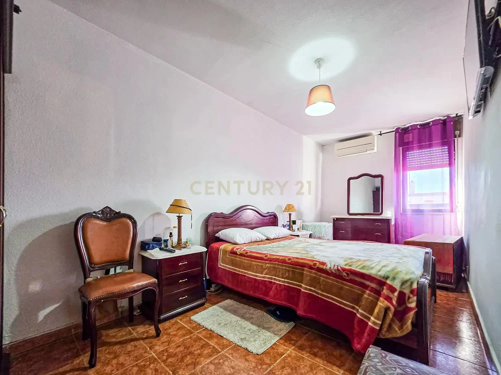 Bedroom; tile floor, natural light
